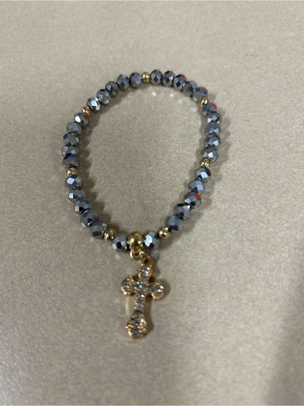 Silver metallic Faceted Bead Stretch Bracelet with Gold Cross Charm